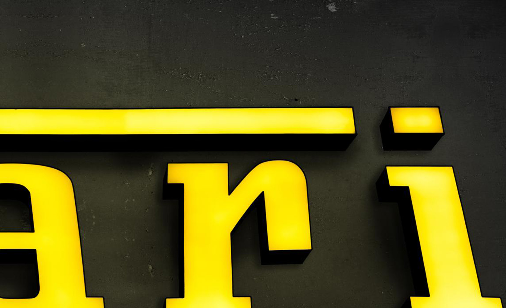 Monumental Ferrari dealer sign — right end detail